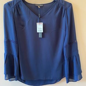 Chiffon material blouse with detailed bell sleeves